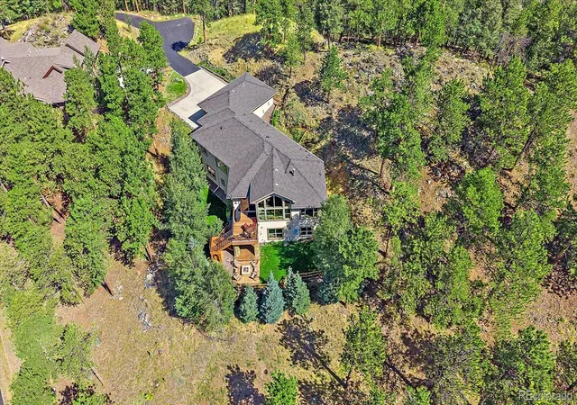 Photo 3 of Single family home for sale at 1029 Blue Grass Trl, Evergreen, CO 80439 | MLS# 3209017 | Listing updated on 2026-10-08