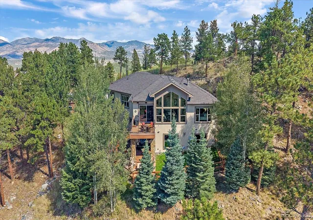 Photo 4 of Single family home for sale at 1029 Blue Grass Trl, Evergreen, CO 80439 | MLS# 3209017 | Listing updated on 2026-10-08
