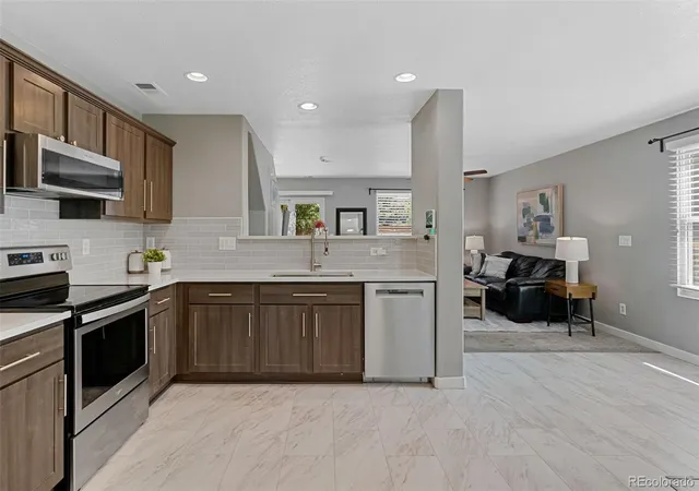 Photo 2 of Townhouse for sale at 882 Mockingbird Ln, Brighton, CO 80601 | MLS# 4474558 | Listing updated on 2026-10-06