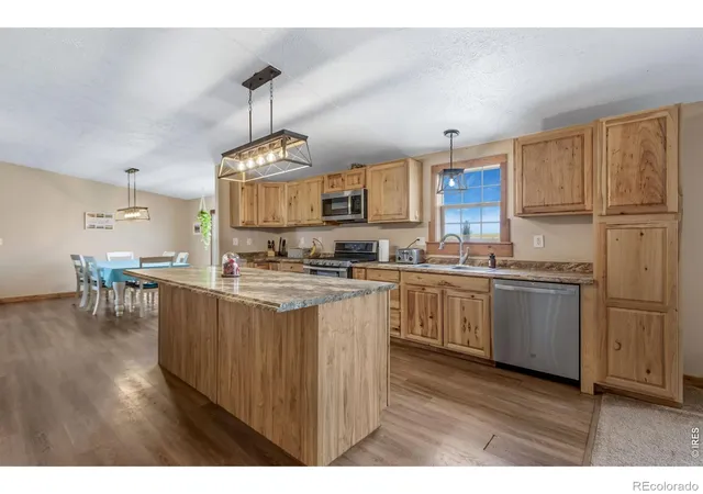 Photo 3 of Single family home for sale at 40265 County Rd 106, Briggsdale, CO 80611 | MLS# IR1068291 | Listing updated on 2026-09-30