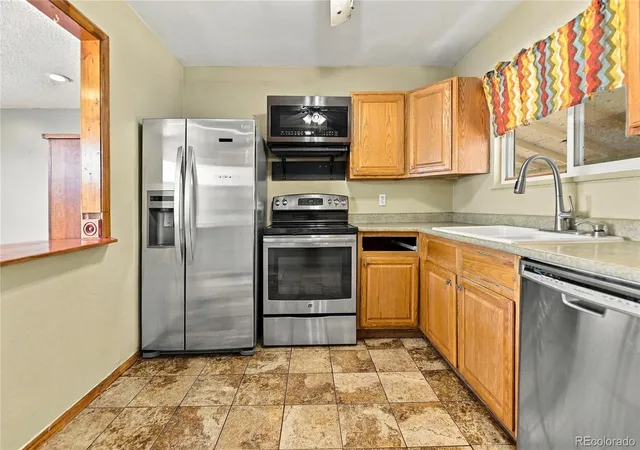 Photo 4 of Single family home for sale at 7090 W Iowa Ave, Lakewood, CO 80232 | MLS# 6811850 | Listing updated on 2026-10-07