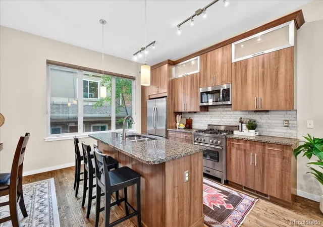 Photo 3 of Townhouse for sale at 3058 Wyandot St, Denver, CO 80211 | MLS# 3154778 | Listing updated on 2026-10-17