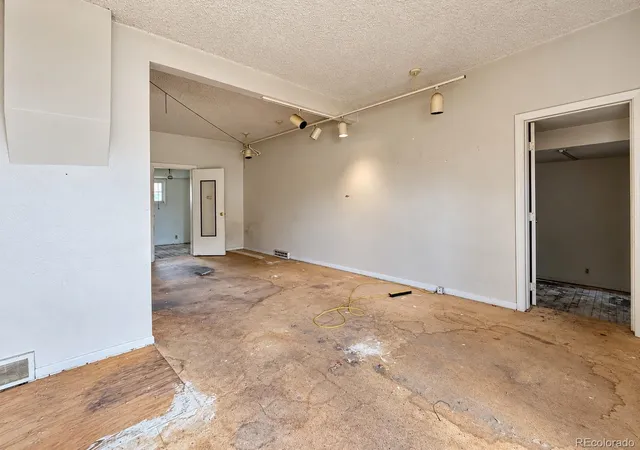Photo 3 of Single family home for sale at 1309 Chester St, Aurora, CO 80010 | MLS# 1999631 | Listing updated on 2026-09-21