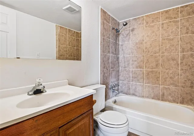 Listing Photo 2 - Condo for sale in building located at 10211 Ura Ln, Thornton, CO 80260 - Unit #9-207