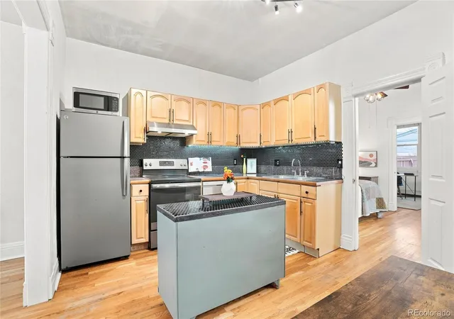 Photo 2 of Townhouse for sale at 1769 N Washington St, Denver, CO 80203 | MLS# 4624978 | Listing updated on 2026-09-17