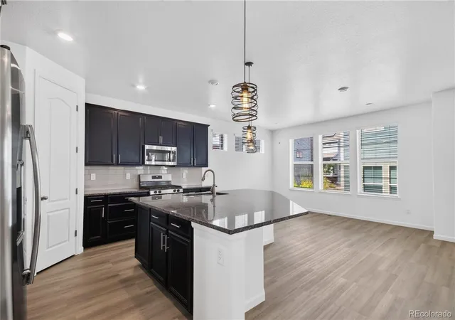 Photo 3 of Single family home for sale at 9725 Bennett Peak St, Littleton, CO 80125 | MLS# 8883705 | Listing updated on 2026-09-13