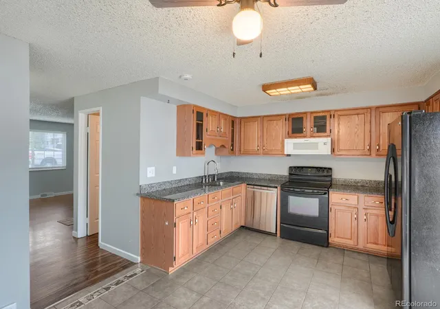 Photo 3 of Condo for sale at 14089 E Utah Cir, Aurora, CO 80012 | MLS# 7002462 | Listing updated on 2026-09-24