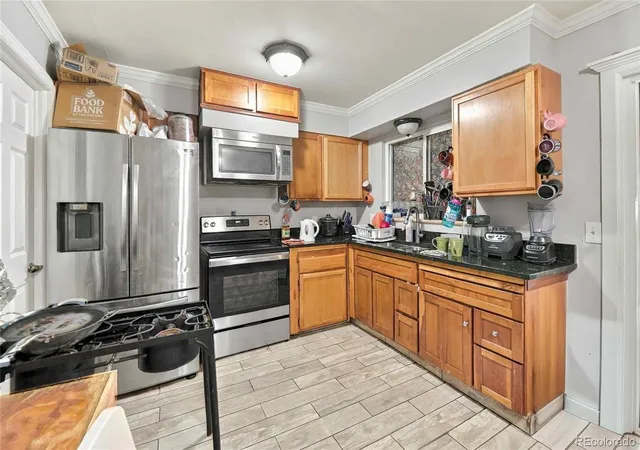 Single family home for sale at 540 Uvalda St, Aurora, CO 80011 | MLS# 1613334