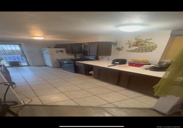 Photo 3 of Single family home for sale at 1037 S Perry St, Denver, CO 80219 | MLS# 3313059 | Listing updated on 2026-09-14