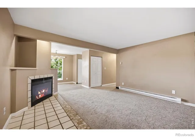 Listing Photo 2 - Condo for sale in building located at 1301 University Ave, Fort Collins, CO 80521 - Unit #201