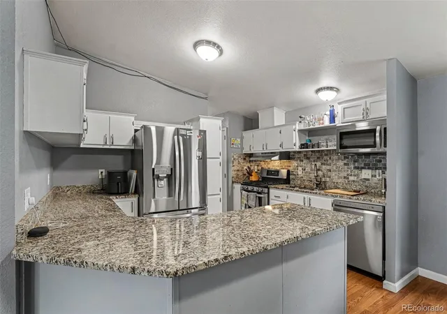 Photo 4 of Single family home for sale at 2301 Florence St, Aurora, CO 80010 | MLS# 3797863 | Listing updated on 2026-09-22