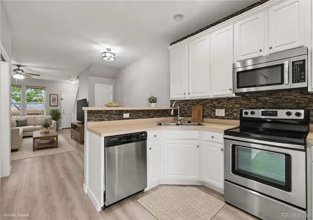 Photo 2 of Condo for sale at 15612 E 96th Way #12D, Commerce City, CO 80022 | MLS# 6879125 | Listing updated on 2026-09-19