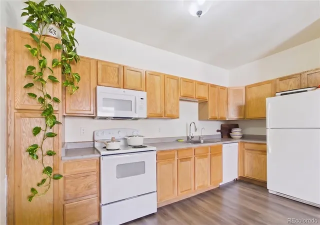 Photo 3 of Condo for sale at 7170 S Wenatchee Way #F, Aurora, CO 80016 | MLS# 4363401 | Listing updated on 2026-09-23