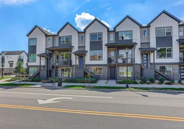 Photo 1 of Townhouse for sale at 12328 W 52nd Avenue, Wheat Ridge, CO 80033 | MLS# 5357391 | Listing updated on 2026-09-22