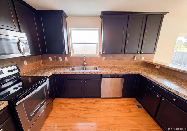 Photo 2 of Single family home for sale at 2084 Basil St, Strasburg, CO 80136 | MLS# 4686358 | Listing updated on 2026-10-09