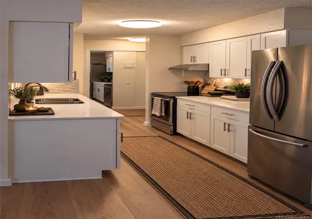 Photo 2 of Condo for sale at 7455 E Quincy Ave #104, Denver, CO 80237 | MLS# 9481146 | Listing updated on 2026-09-26
