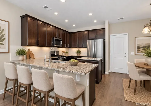 Photo 4 of Townhouse for sale at 15423 W 65th Avenue #B, Arvada, CO 80007 | MLS# 2352110 | Listing updated on 2026-09-24