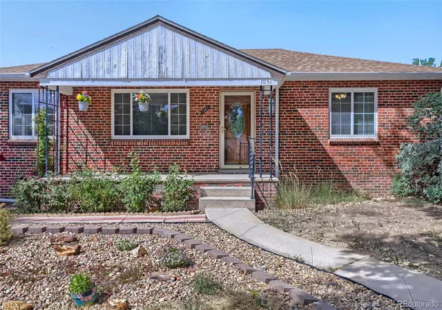 Photo 2 of Single family home for sale at 1051 Macon St, Aurora, CO 80010 | MLS# 6258627 | Listing updated on 2026-10-09