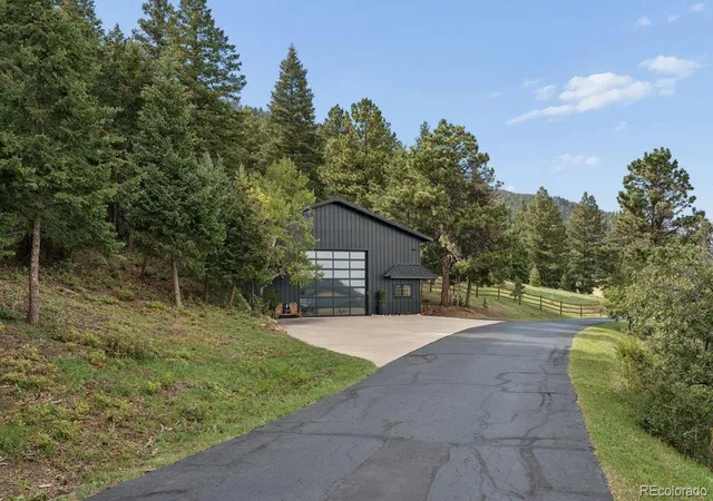 Photo 2 of Mansion for sale at 15533 S Perry Park Rd, Larkspur, CO 80118 | MLS# 6741482 | Listing updated on 2026-09-18