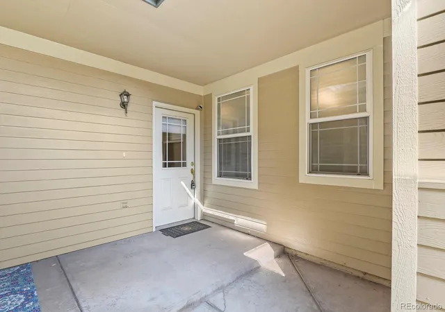 Photo 2 of Townhouse for sale at 8327 S Garland Cir, Littleton, CO 80128 | MLS# 5447292 | Listing updated on 2026-09-22