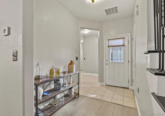Photo 3 of Townhouse for sale at 8327 S Garland Cir, Littleton, CO 80128 | MLS# 5447292 | Listing updated on 2026-09-22