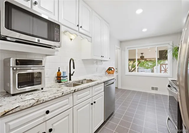 Photo 2 of Single family home for sale at 1990 S Stuart St, Denver, CO 80219 | MLS# 5711627 | Listing updated on 2026-09-19