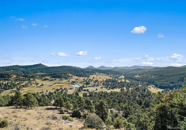 Photo 4 of Single family home for sale at 6954 Olympus Dr, Evergreen, CO 80439 | MLS# 6680027 | Listing updated on 2026-10-03