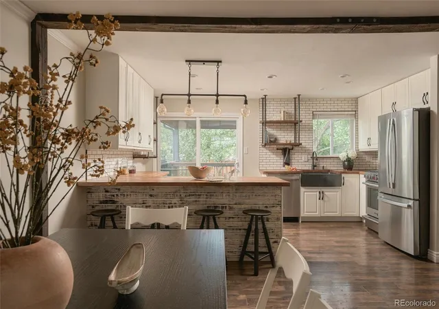 Photo 3 of Single family home for sale at 7058 W Roxbury Ave, Littleton, CO 80128 | MLS# 4249551 | Listing updated on 2026-09-25