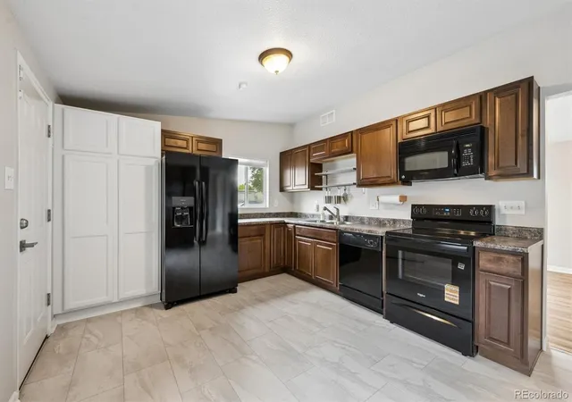 Photo 3 of Single family home for sale at 2201 W 56th Place, Denver, CO 80221 | MLS# 2741939 | Listing updated on 2026-10-28