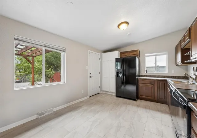 Photo 4 of Single family home for sale at 2201 W 56th Place, Denver, CO 80221 | MLS# 2741939 | Listing updated on 2026-10-28
