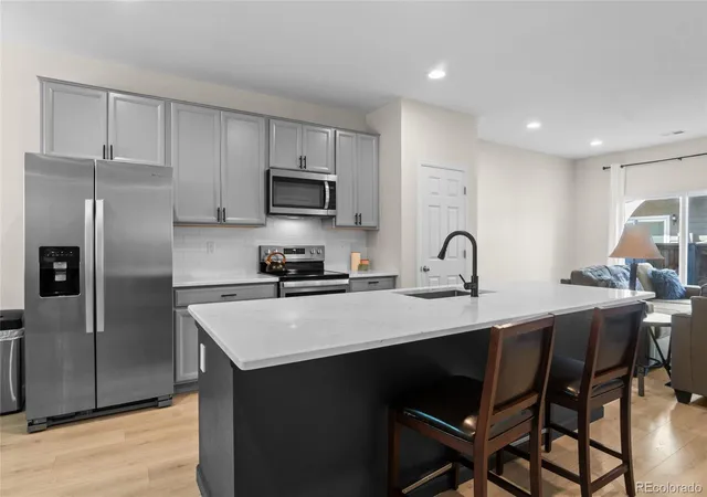 Photo 1 of Condo for sale at 14700 E 104th Avenue #1405, Commerce City, CO 80022 | MLS# 3242960 | Listing updated on 2026-09-24