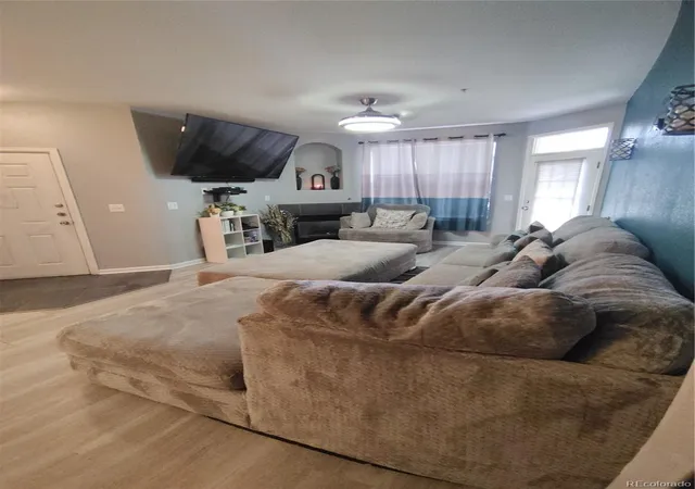Photo 3 of Condo for sale at 5703 N Gibralter Way #105, Aurora, CO 80019 | MLS# 6977752 | Listing updated on 2026-09-23