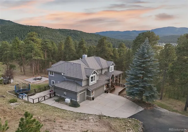 Single family home for sale at 7086 Timbers Dr, Evergreen, CO 80439 | MLS# 6696516
