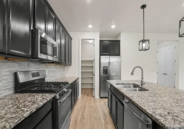 Photo 3 of Single family home for sale at 10931 Uvalda St, Commerce City, CO 80022 | MLS# 3928689 | Listing updated on 2026-09-26