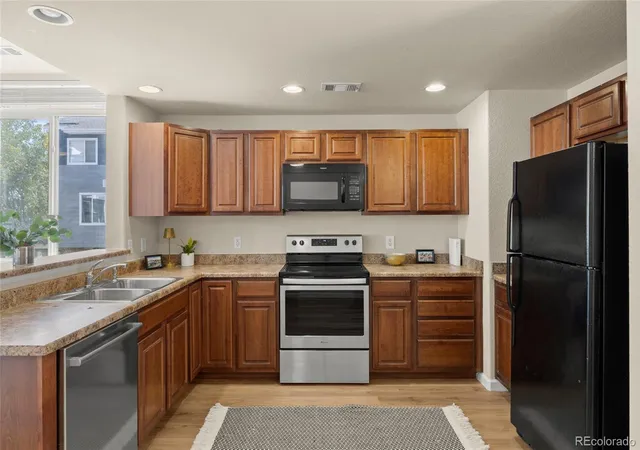 Photo 2 of Townhouse for sale at 8751 Pearl St #Q1, Thornton, CO 80229 | MLS# 5637274 | Listing updated on 2026-09-24