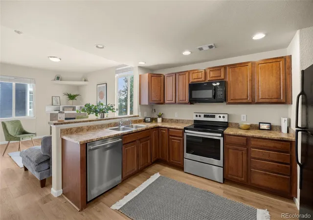 Photo 3 of Townhouse for sale at 8751 Pearl St #Q1, Thornton, CO 80229 | MLS# 5637274 | Listing updated on 2026-09-24