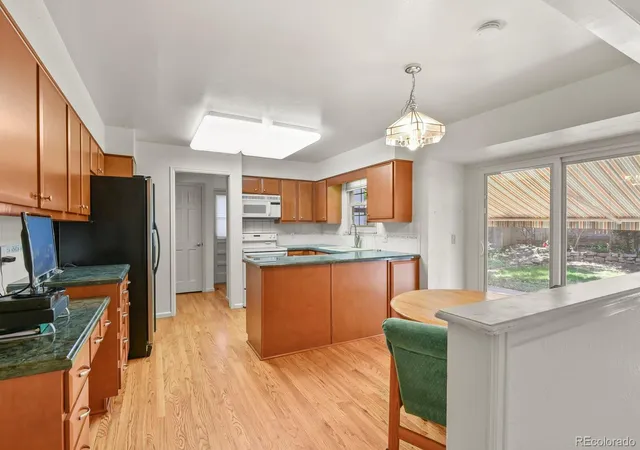 Photo 2 of Single family home for sale at 12506 E Vassar Dr, Aurora, CO 80014 | MLS# 5584377 | Listing updated on 2026-09-23