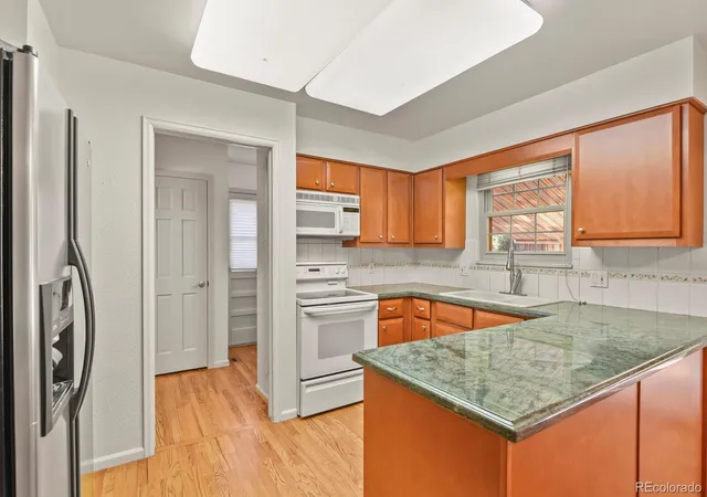 Photo 3 of Single family home for sale at 12506 E Vassar Dr, Aurora, CO 80014 | MLS# 5584377 | Listing updated on 2026-09-23