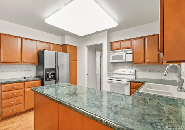 Photo 3 of Single family home for sale at 12506 E Vassar Dr, Aurora, CO 80014 | MLS# 5584377 | Listing updated on 2026-09-23