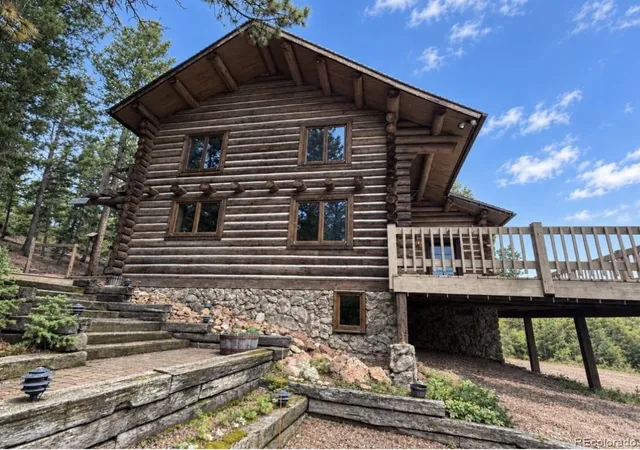Photo 2 of Single family home for sale at 8899 William Cody Dr, Evergreen, CO 80439 | MLS# 3844969 | Listing updated on 2026-09-23