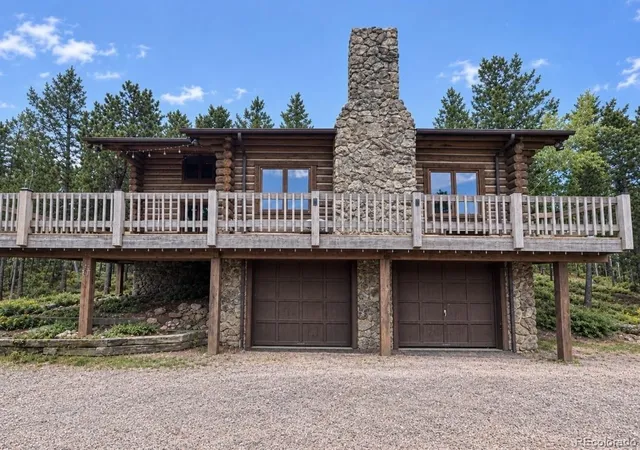 Photo 3 of Single family home for sale at 8899 William Cody Dr, Evergreen, CO 80439 | MLS# 3844969 | Listing updated on 2026-09-23