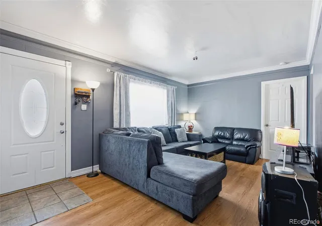Photo 3 of Single family home for sale at 871 Victor St, Aurora, CO 80011 | MLS# 2305637 | Listing updated on 2026-09-23