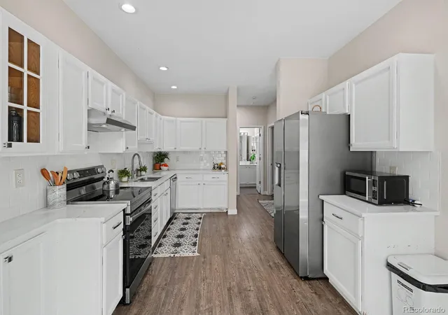 Photo 4 of Townhouse for sale at 9792 E Hawaii Pl, Aurora, CO 80247 | MLS# 7852769 | Listing updated on 2026-10-06