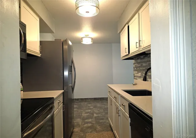 Photo 4 of Condo for sale at 7755 E Quincy Ave #103, Denver, CO 80237 | MLS# 6338994 | Listing updated on 2026-10-01