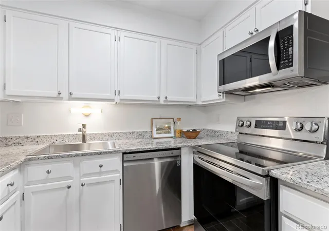 Photo 3 of Condo for sale at 410 Zang St #2-103, Lakewood, CO 80228 | MLS# 2283600 | Listing updated on 2026-09-23