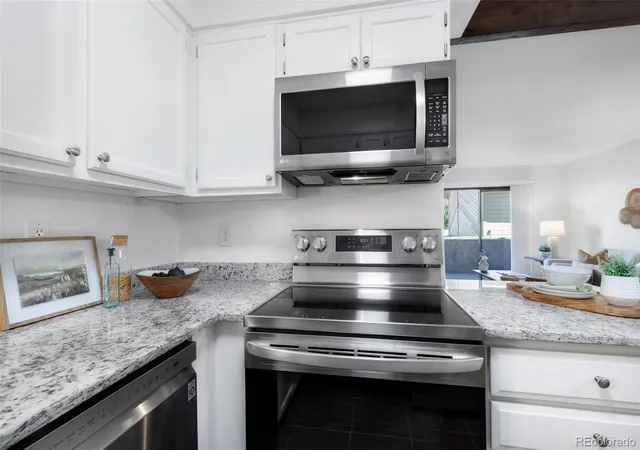 Photo 4 of Condo for sale at 410 Zang St #2-103, Lakewood, CO 80228 | MLS# 2283600 | Listing updated on 2026-09-23