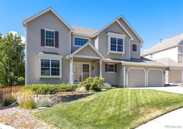 Photo 2 of Single family home for sale at 14210 W Evans Cir, Lakewood, CO 80228 | MLS# 9740049 | Listing updated on 2026-09-24