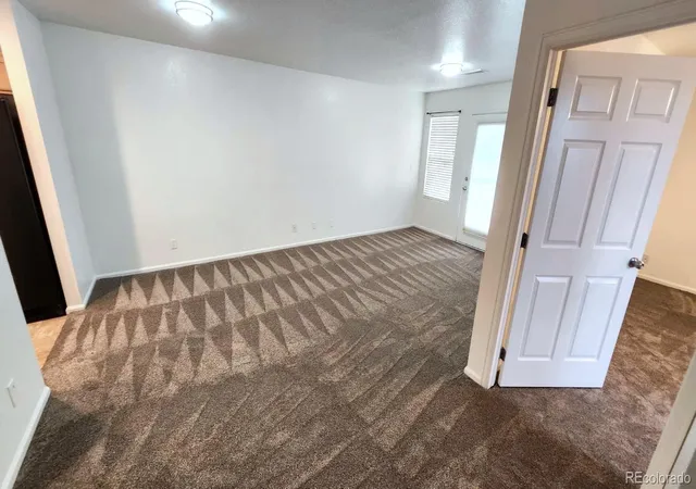 Photo 4 of Condo for sale at 18736 E 57th Place #F, Denver, CO 80249 | MLS# 9291062 | Listing updated on 2026-09-23