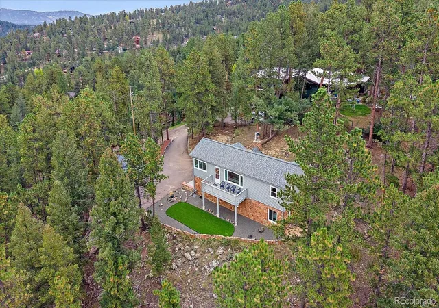 Photo 1 of Single family home for sale at 28001 Camel Hts Cir, Evergreen, CO 80439 | MLS# 4092509 | Listing updated on 2026-10-06