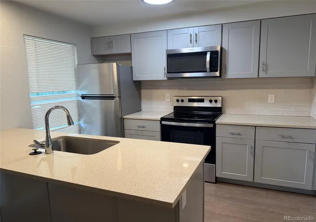 Photo 1 of Townhouse for sale at 1439 Norfolk St, Aurora, CO 80011 | MLS# 7457292 | Listing updated on 2026-09-23